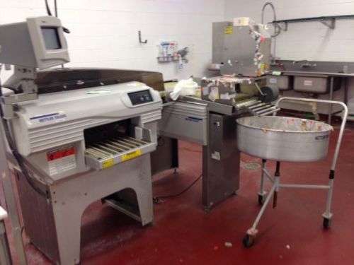 &#034;METTLER TOLEDO SOLO&#034; COMMERCIAL HIGH SPEED MEAT WRAPPING AND LABELING MACHINE