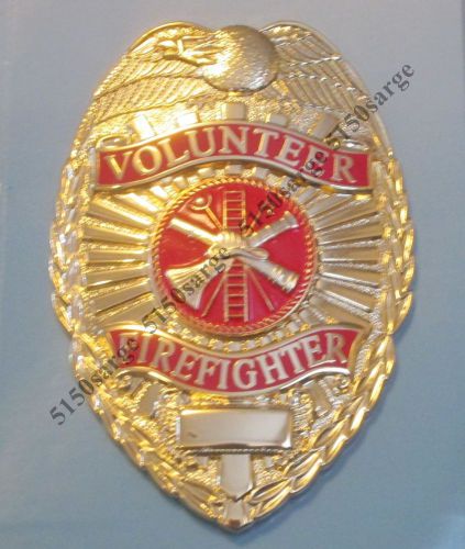 Gold volunteer firefighter badge, eagle top shield shaped for sale
