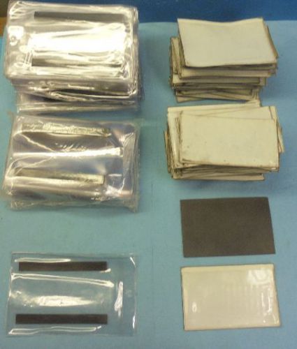 NEW AND USED LOT OF CLEAR AND WHITE BACKGROUND MAGNETIC LABEL HOLDERS
