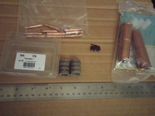 Tweco misc welding parts cheap .035 tips. 24A-62 Cones. 34A Insulators. switch