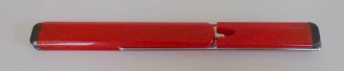 Red Folding Pen.  Pen unfolds to show ball point nib.  Made in Korea.