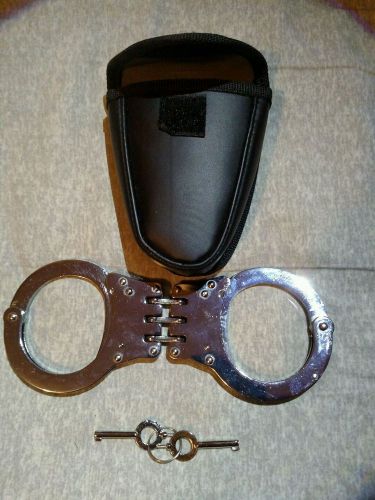 Authentic hinged police handcuffs. double locking with keys and carry pouch. for sale