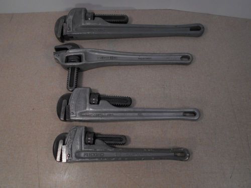Four Ridgid aluminum pipe wrenches. 18&#034;-14&#034;-12&#039; and 14&#034; offset.