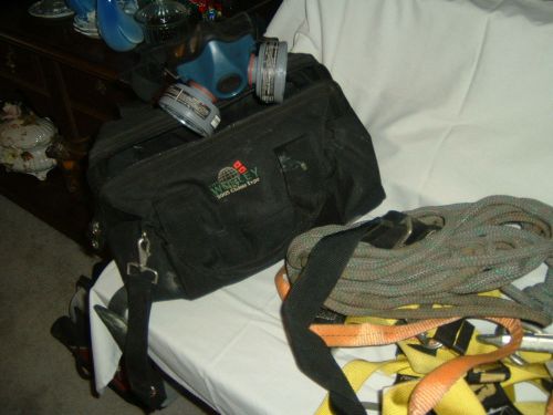 Respirator, safety harness, rope and bag.