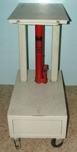 WELL BUILT ROLL AROUND HYDRAULIC JACK TABLE,