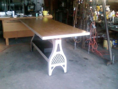 REPURPOSED TABLE WITH  CAST IRON LEGS