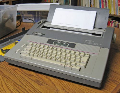 Smith Corona Electronic Typewriter / Word Processor, with supplies