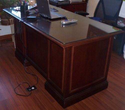 Glass top executive desk 60&#034; in width, 30&#034; high and 30&#034; deep;
