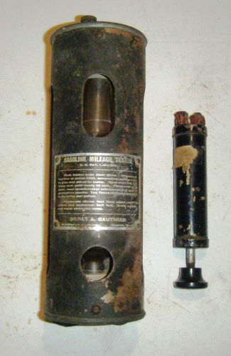 Awesome old gasoline mileage tester w/syringe pump vacomat? for sale