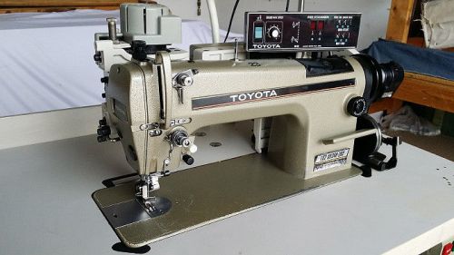 Toyota automatic needle feed sewing machine with racing puller for sale