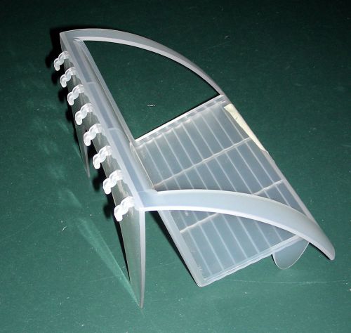 desk shelf = Herman Miller translucent plastic organizer