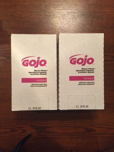 Two GOJO 7220 RICH PINK Antibacterial Lotion Soap Refill 67 fL OZ. Pink