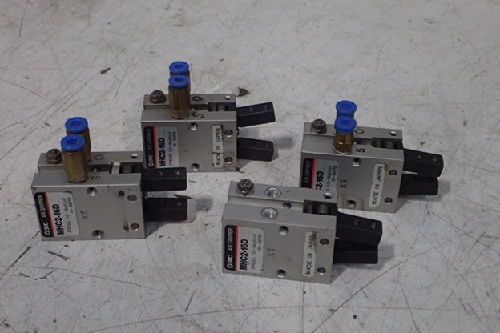 Four (4) SMC MHC2-16D PNEUMATIC GRIPPERs/ used/ lot of 4
