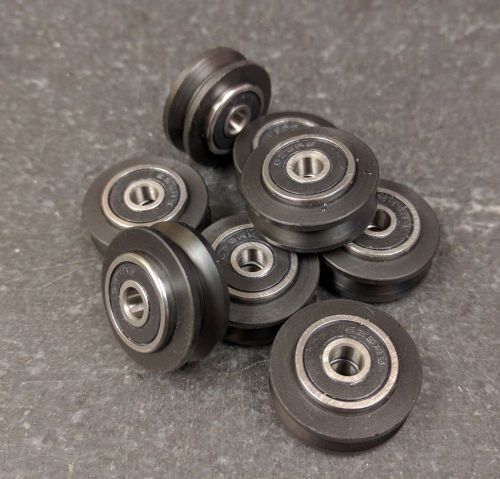 (24) fully assembled delrin v-groove wheels for sale
