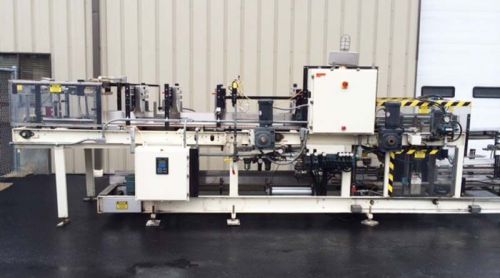 Hartness model 825 case packer with infeed servo laner for sale