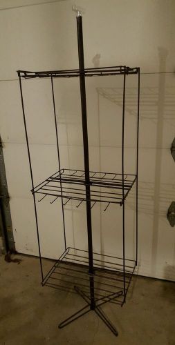 Wire floor spinning retail display rack wtth sign holder for sale