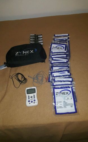zynex medical electrotherapy electrodes muscle theropy W/ batteries and 56 pads