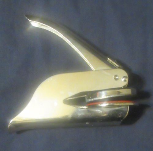 Chrome? hand embosser. Kendell Realty Corp 1972 (Ideal pocket seal)