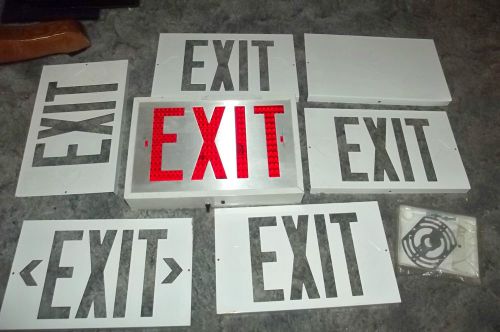 Light up exit sign with other exit plates used as is for sale
