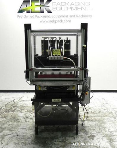 Used- Multicage Four-Post Die Cutter Air Press. Approximate platen size 25&#034; x 22