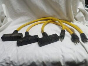 Three Yellow and Black 3-Way Cord Adapters