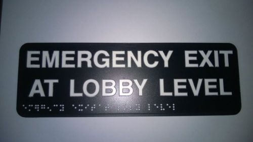 Emergency Exit Signs - 32 Brand New.  Osha compliant. Brail.