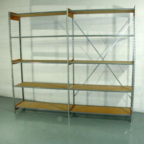 Lozier wooden backroom shelving per section. 7&#039; x 4&#039; x 2&#039; storing inventory. for sale
