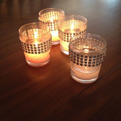 Votive containers for candles with 3 inch bling attached pink and white candles