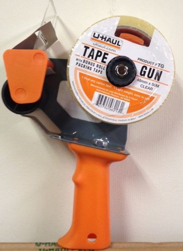 Tape gun dispenser with tape. Good for packing, shipping, moving, etc.