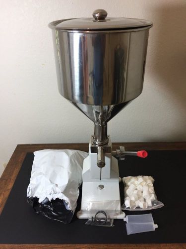 Model sgy-a03 manual filling machine 5-50 grams liquid, ointment, paste, lotions for sale