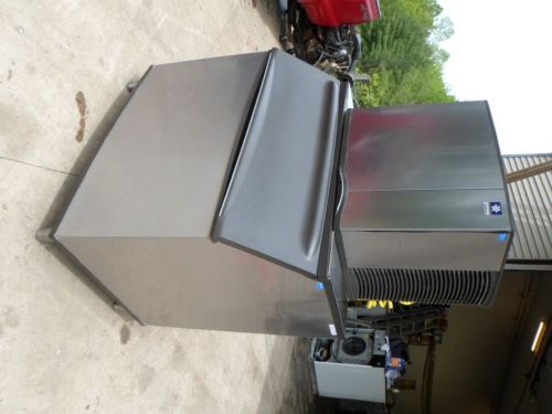 MANITOWOC ICE MACHINE MD:SY1004A  208-230 VOLT. WITH STORAGE MEANS.  USED