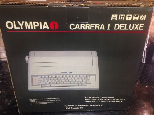 Vintage olympia carrera i deluxe electric typewriter working with auto erase for sale
