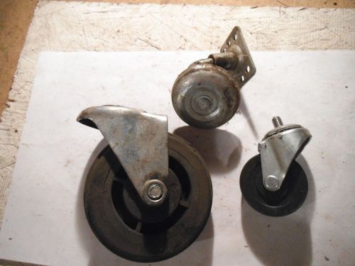 WHEELS / CASTERS LOT OF 3, ALL HAVE BEEN USED / DIRTY, LARGEST IS 4&#034; DIA.