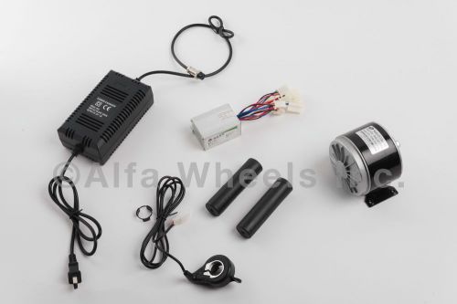 Used 250 w 24 v dc electric motor kit w speed control thumb throttle &amp; charger for sale