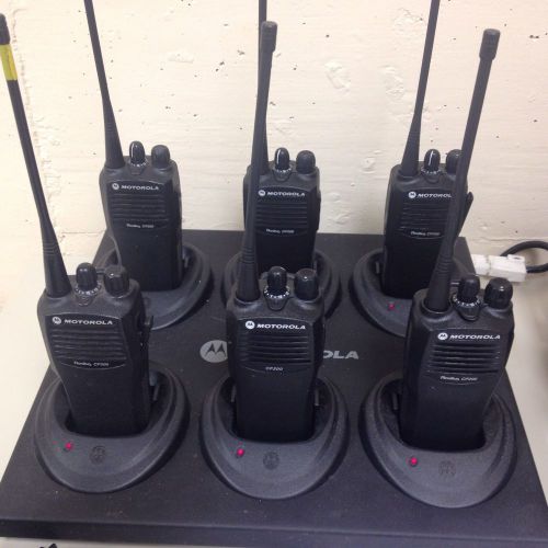 6 Motorola CP200 UHF 4 Channel Radios With 6 Pocket Gang Charger