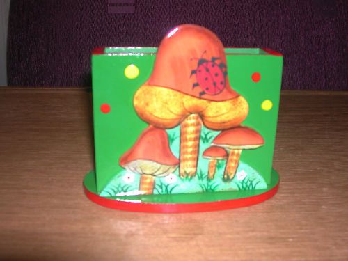 Wooden letter holder painted colorfully with mushrooms