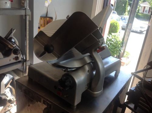 Berkel 909 deli meat slicer with sharpener ready to slice your meat! ss grip for sale