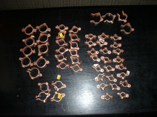 Phd copper hinged split clamp hangers. (48). (9)1 1/4&#034;,(4)1&#034;,(12)3/4&#034; &amp; (23)1/2&#034; for sale