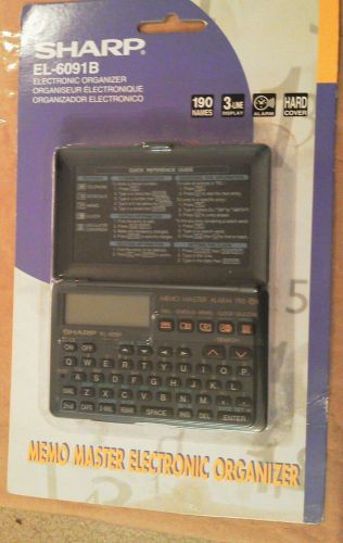 Sharp electronic organizer. EL 6091B calculator
