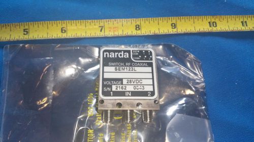 Narda RF Coaxial Switch.  28 VDC. P/N SEM123L.  SMA female connectors.