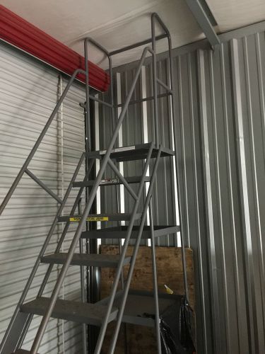 Tri arc rolling warehouse steel ladder 122&#034; tall 2 shelf bought new barely used for sale