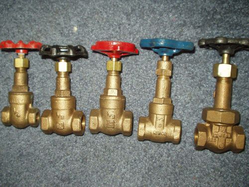 Collection of four 1/2&#034; npt brass gate valves and one 1/4&#034; npt gate valve for sale
