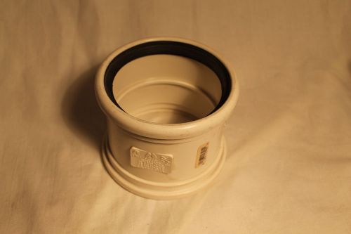 4 inch gasketed sewer coupling - PVC NEW from Lowes Item 3537 FREE SHIPPING