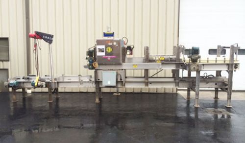 Hartness model 2600 continuous motion case packer with change parts for sale