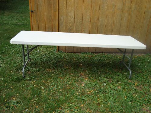 FOUR 8 FT HEAVY DUTY TABLES@ WITH FOLDING LEGS. NO RESERVE!!