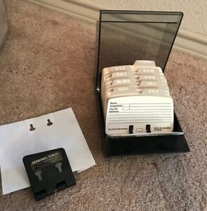 2 hole punch, rolodex card holder with cards
