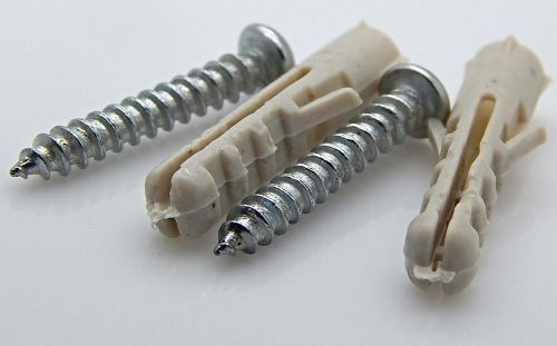 2 New star screws with their wall sockets
