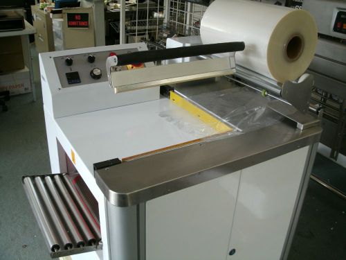 Compact fm-400 dual function full hidden shrink tunnel &amp; above sealing machine for sale