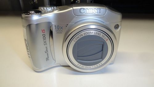 S11: Canon PowerShot SX100 IS 8.0 MP Digital Camera