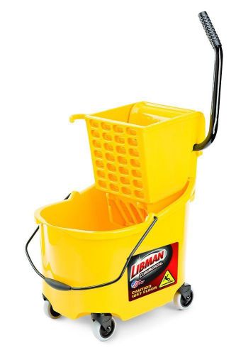 Libman commercial 933 26 quart mop bucket and wringer with 2 mop heads included for sale